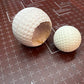 Multiplying Golf Balls by Viking ala Billiard Balls