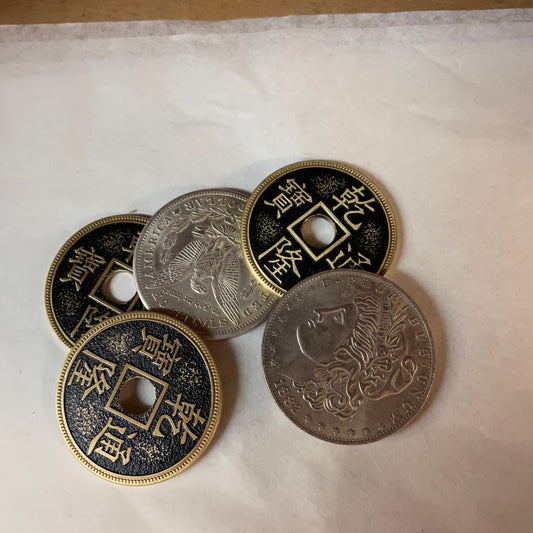 Hopping Morgan and Chinese coin