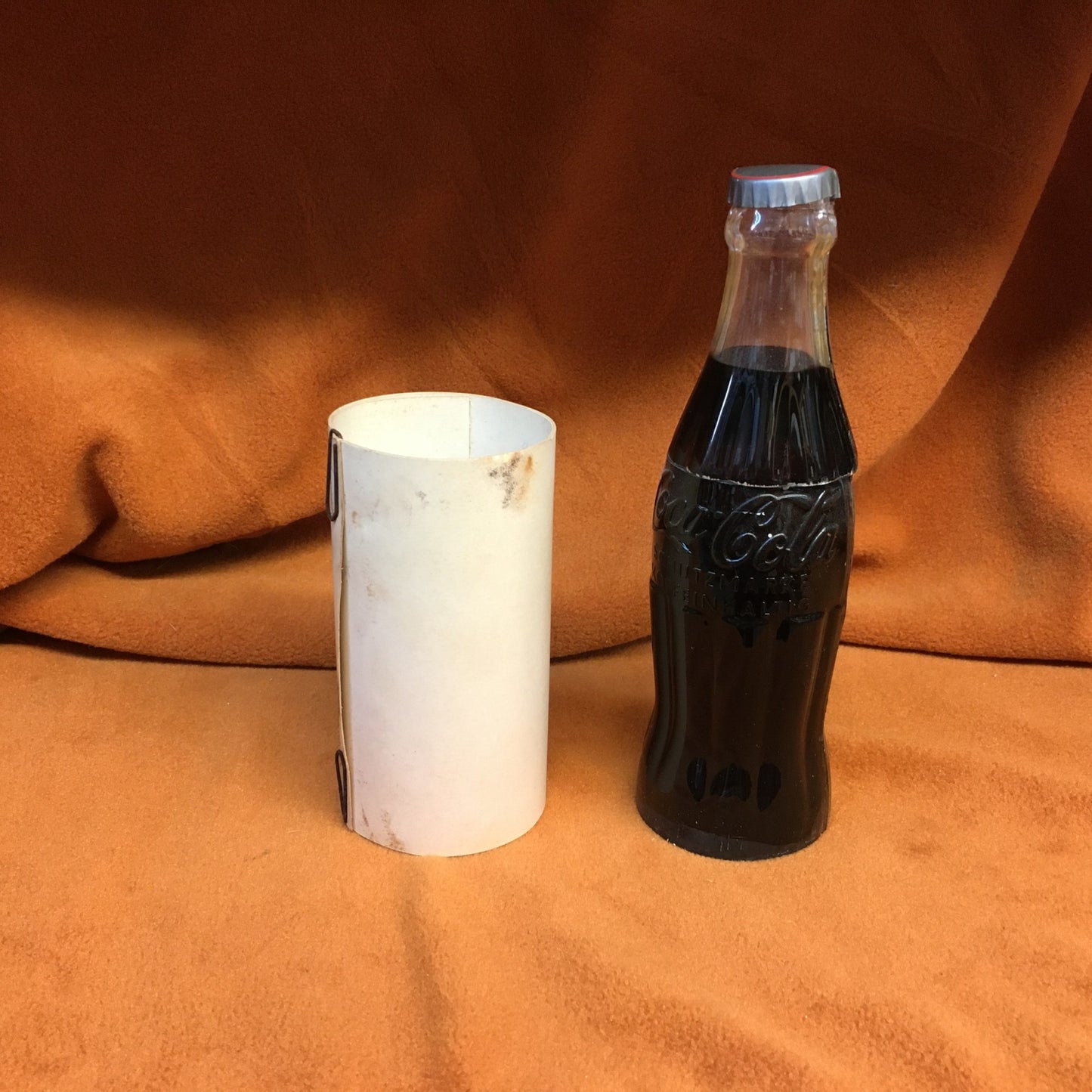 Vanishing Coke Bottle